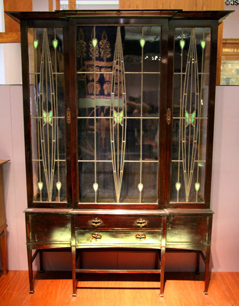 Display cabinet (1901) by Ernest Archibald Taylor made by Wylie & Lochhead of Glasgow at Kelvingrove Art Gallery. Glasgow, Scotland.