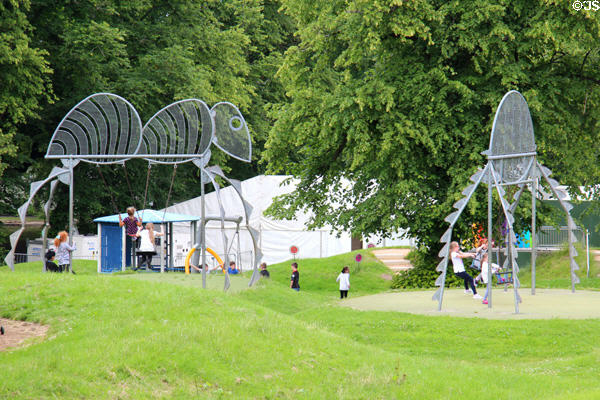 Giant insect sculpture in Bellahouston Park playground seen from House for an Art Lover. Glasgow, Scotland.