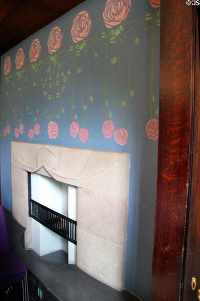 Fireplace painted with roses at House for an Art Lover. Glasgow, Scotland.