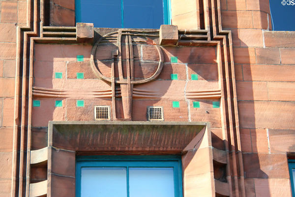 Mackintosh designed oval medallion on rear facade at Scotland Street School. Glasgow, Scotland.