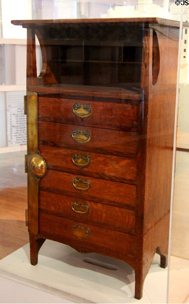 Locking chest of drawers with open shelf by Charles Rennie Mackintosh at The Lighthouse. Glasgow, Scotland.