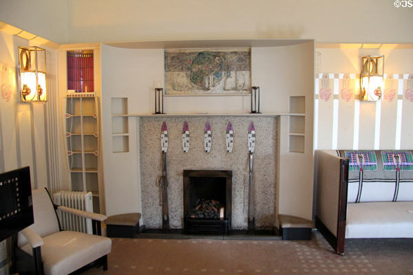 Drawing room fireplace area with inset shelves at Hill House. Helensburgh, Scotland.