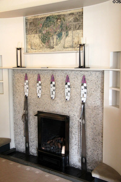 Drawing room fireplace area with candlesticks & gesso panel at Hill House. Helensburgh, Scotland.