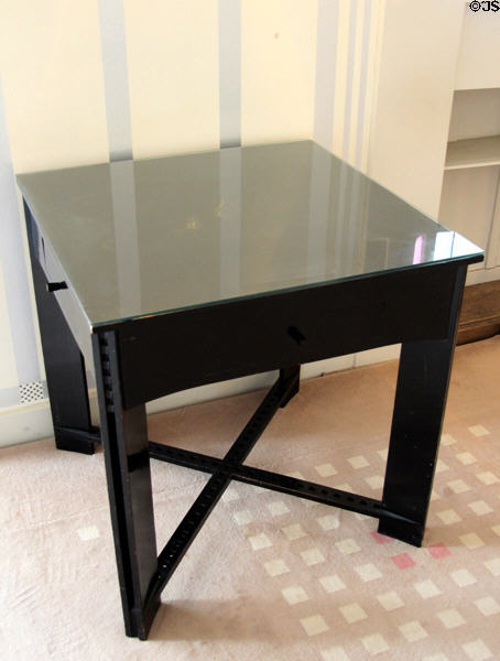 Small ebonized cube table (1904) by C.R. Mackintosh on modern copy of original carpet in drawing room at Hill House. Helensburgh, Scotland.