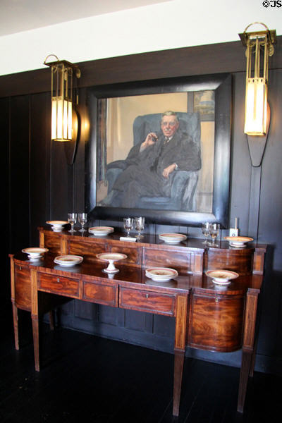 Sideboard under portrait in dining room at Hill House. Helensburgh, Scotland.
