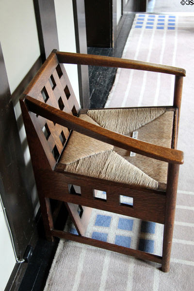 Hall armchair (1904) with woven seat by C.R. Mackintosh at Hill House. Helensburgh, Scotland.