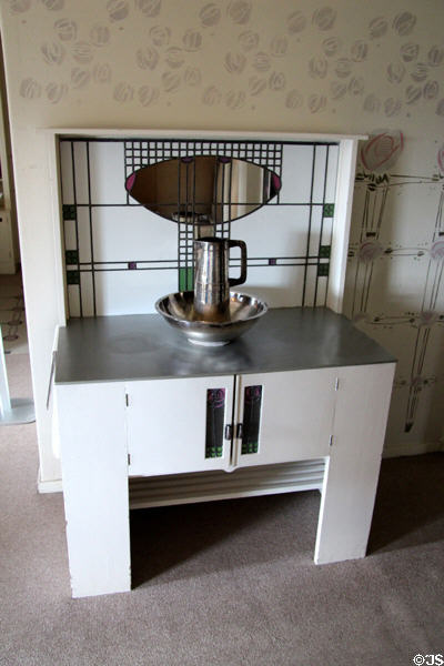 Washstand by C.R. Mackintosh with silver-plated pitcher & basin in main bedroom at Hill House. Helensburgh, Scotland.