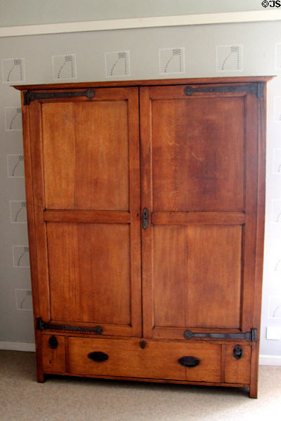 Oak press cupboard (c1894) by C.R. Mackintosh for Guthrie & Wells of Glasgow which was owned by Blackie family before they commissioned Hill House at Hill House. Helensburgh, Scotland.