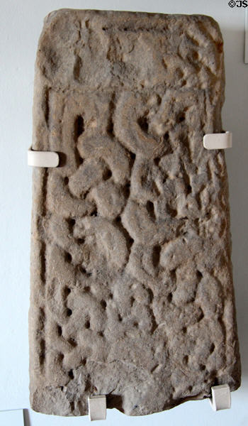 Grave-slab fragment (900s) with interlaced pattern at Dumbarton Castle. Glasgow, Scotland.