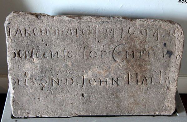 Stone slab (1704) carved by prisoner held for Jacobite sympathies at Dumbarton Castle. Glasgow, Scotland.