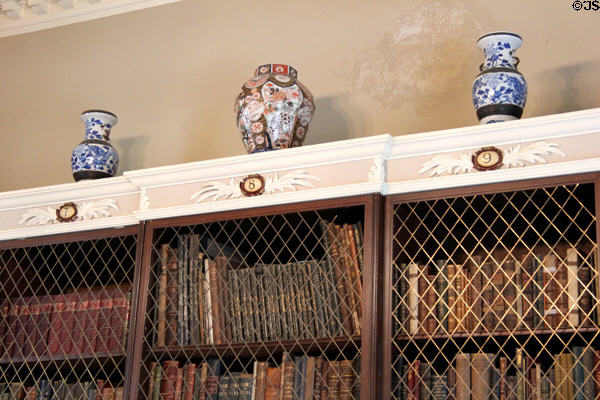 Chinese vases atop bookcases in Library at Pollok House. Glasgow, Scotland.