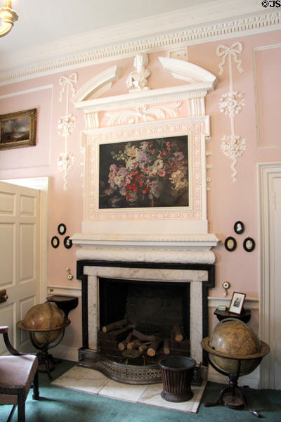 Georgian stucco decoration around fireplace in business room at Pollok House. Glasgow, Scotland.