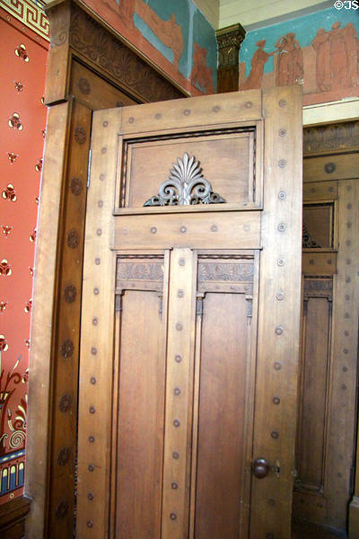 Elaborate Greek-themed door in dining room at Holmwood. Glasgow, Scotland.