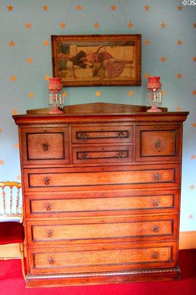 Bedroom chest of drawers with lustres at Holmwood. Glasgow, Scotland.