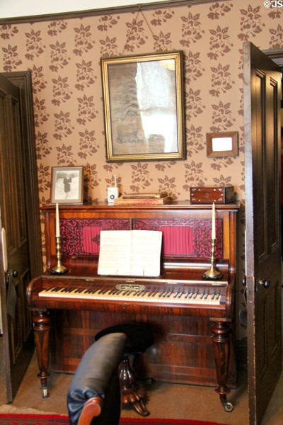 Parlor piano by Laubach & Sons of Edinburgh at Tenement House museum. Glasgow, Scotland.