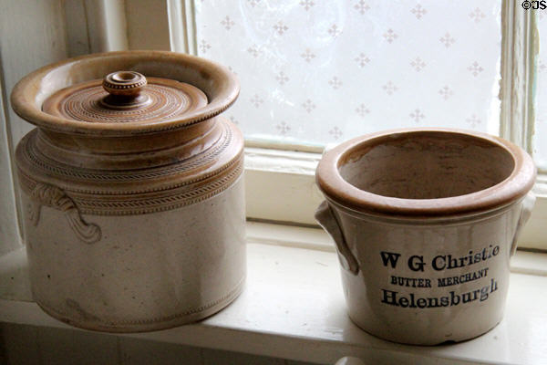 Stoneware crocks in kitchen in Reid farmhouse at National Museum of Rural Life. Kittochside, Scotland.