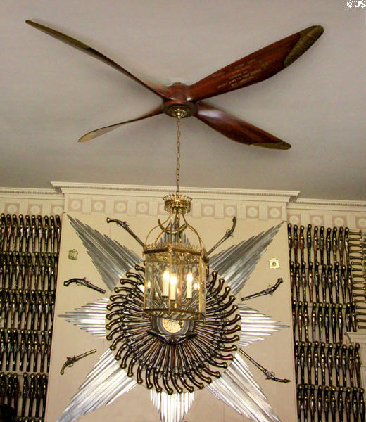 BE2c biplane propeller from WWII supporting lamp in front of frieze & chimneypiece designed by Robert Adam in Armory at Culzean Castle. Maybole, Scotland.