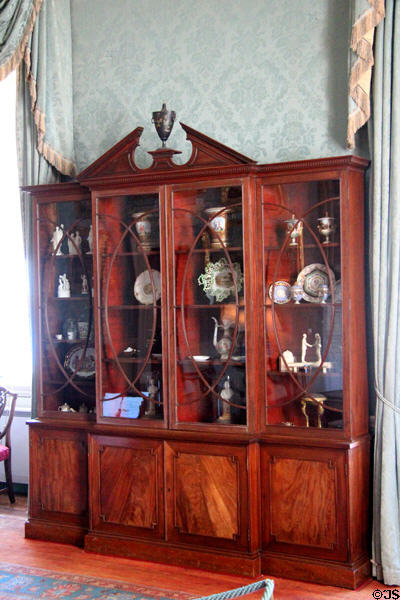 Neoclassical china cabinet in Blue drawing room at Culzean Castle. Maybole, Scotland.
