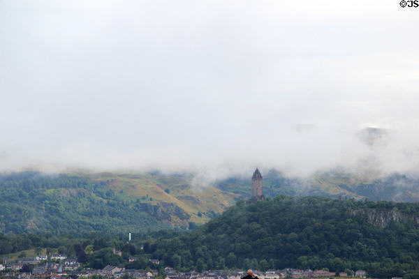 Wallace Monument under clouds. Stirling, Scotland.