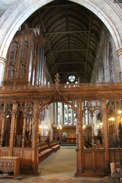 Rood screen (1893) with choir & altar beyond at Dunblane Cathedral. Dunblane, Scotland.