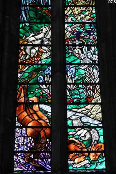 Earth with animals stained glass window (1915) by Louis Davis at Dunblane Cathedral. Dunblane, Scotland.