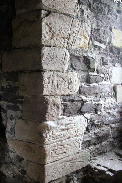 Kitchen stones with grooves made by servants sharpening knives at Doune Castle. Doune, Scotland.