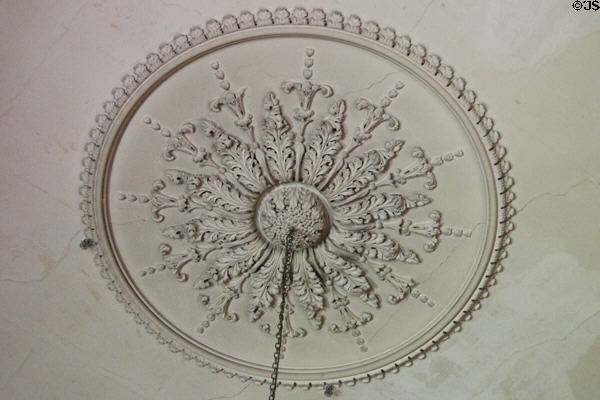 Plasterwork ceiling rose above chandelier in Library at Newhailes. Musselburgh, Scotland.