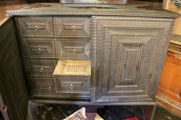 Finely carved chest with drawers in Library at Newhailes. Musselburgh, Scotland.