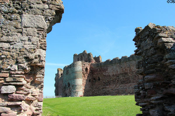 Tantallon Castle framed in ruins of walls. Scotland.