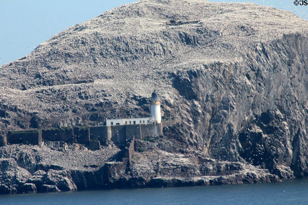 Bass Rock now a bird sanctuary in Firth of Forth with biggest gannet colony in world. Scotland.