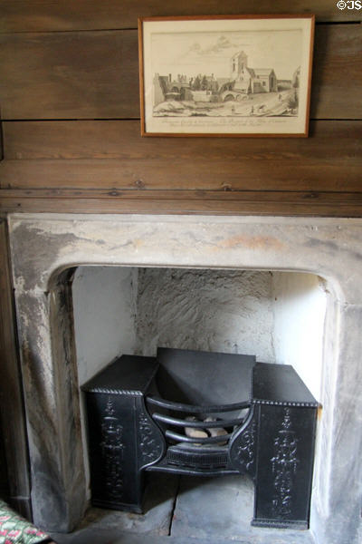 Fireplace & iron firebox in garden room at Culross Palace. Culross, Scotland.