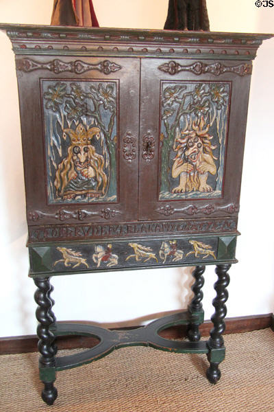 Scandinavian bridal cabinet on legs carved with trolls at The Study. Culross, Scotland.