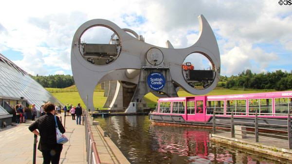 Falkirk Wheel rotates boats between elevated & lower level canal while keeping tubs in which boats float level. Falkirk, Scotland.