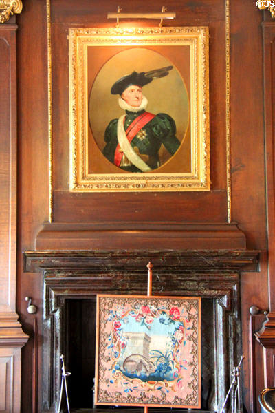 Portrait of John, 4th Earl of Hopetoun as Captain of Company of Archers, (1822) by John Watson Gordon over fire screen embroidered with rabbit in Garden Room at Hopetoun House. Queensferry, Scotland.