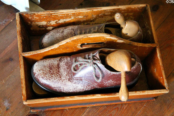 Wooden knife holder with shoes in service area at Hopetoun House. Queensferry, Scotland.