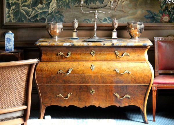 Chest of drawers with ornate hardware & multi-color marble top in dining room at Lauriston Castle. Edinburgh, Scotland.