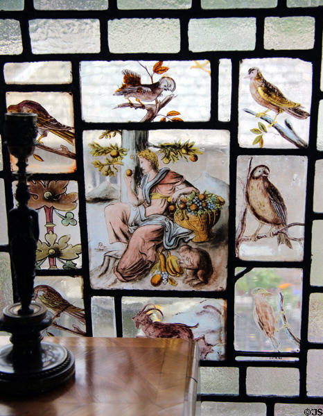 Stained glass, bird-themed, insets in hallway windows at Lauriston Castle. Edinburgh, Scotland.