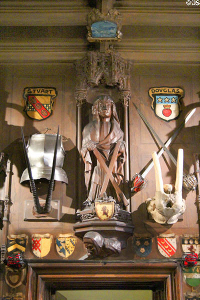Wood carving of St Andrew & arms in entrance hall at Abbotsford House. Melrose, Scotland.