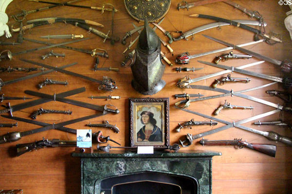Armory with flintlock pistols & crossed swords at Abbotsford House. Melrose, Scotland.