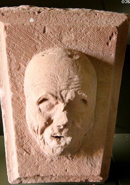 Carved stone keystone with face at Dryburgh Abbey. Scotland.