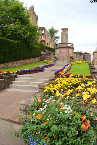 War memorial (1921) with gardens at Jedburgh Abbey. Jedburgh, Scotland. Architect: James B Dunn.
