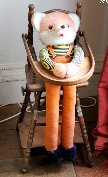 Convertible child's high chair with doll at Manderston House. Duns, Scotland.