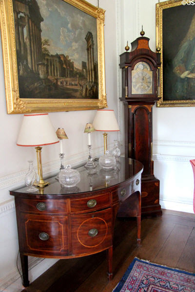 Bowfront sideboard & tall clock in dining room at Manderston House. Duns, Scotland.