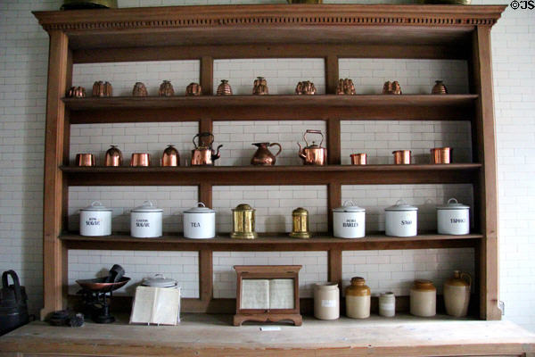 Kitchen shelve with copperware, food canisters & recipe holder at Manderston House. Duns, Scotland.