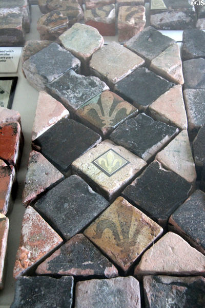 Ancient abbey floor tiles (13thC) in museum at Melrose Abbey. Melrose, Scotland.