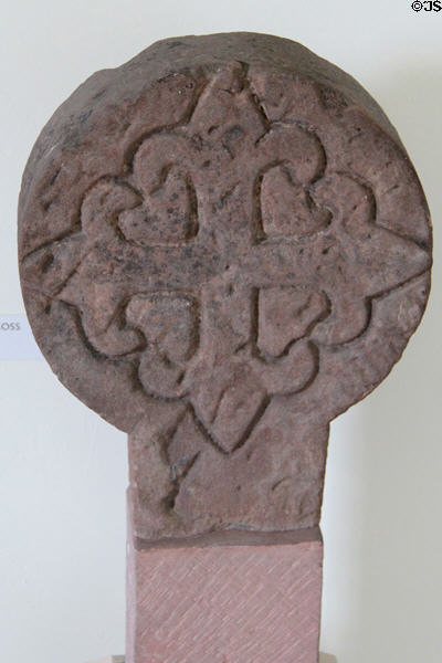 Stone cross head (13thC) in museum at Melrose Abbey. Melrose, Scotland.