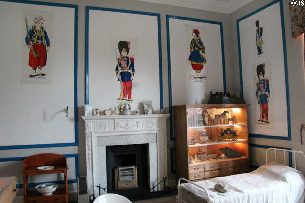 Nursery bedroom with graphics of children as soldiers at Thirlestane Castle. Scotland.