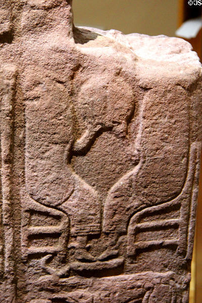 Pictish cross-slab (front figures stone) detail shows Saints Antony & Paul breaking sacramental bread carried to them by a raven at St Vigeans Museum. Arbroath, Scotland.