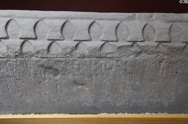 Roof fragment from a Pictish house-shaped shrine found recycled as building block in church wall at St Vigeans Museum. Arbroath, Scotland.
