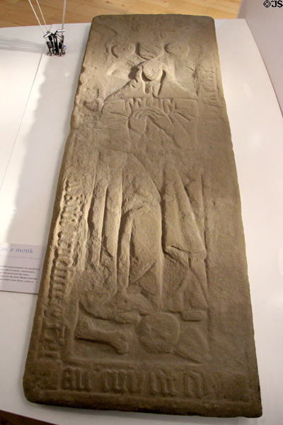 Tombstone with low relief of monk at Arbroath Abbey. Arbroath, Scotland.